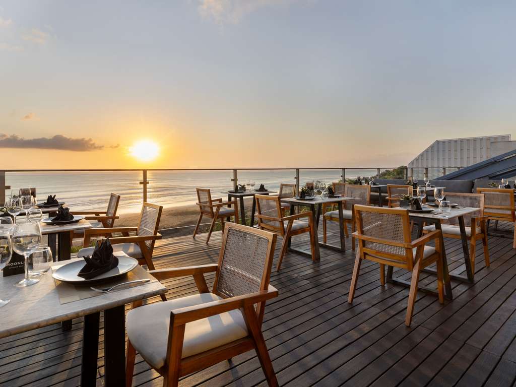 Moonlite Kitchen and Bar at Grand Seminyak overlooking the beach at sunset
